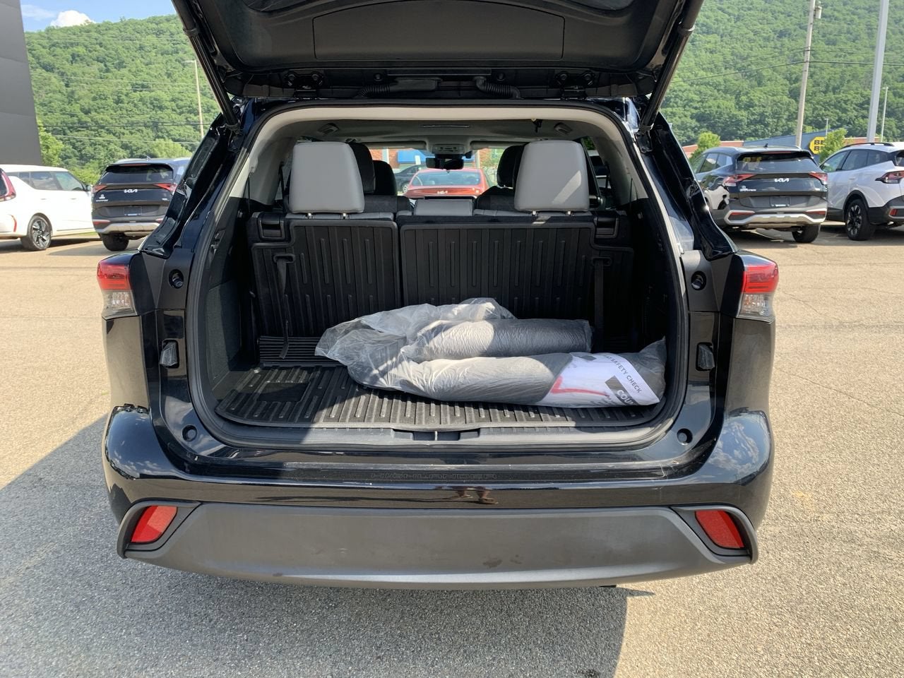 2023 Toyota Highlander Hybrid Bronze Edition